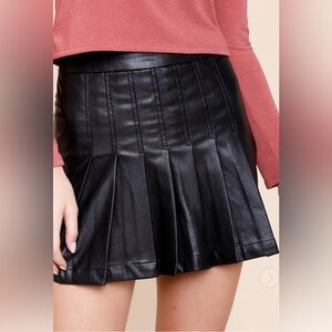 ***SOLD***Francesca’s “Morgan Faux Leather Pleated Mini Skirt”